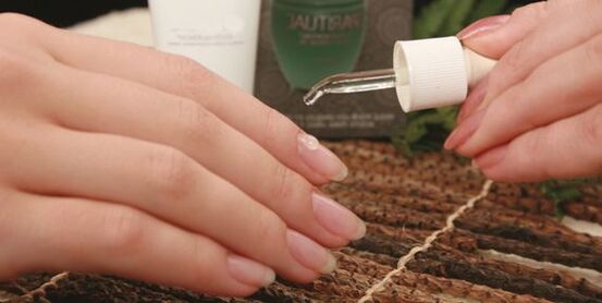 Treatment of nail fungus with essential oil